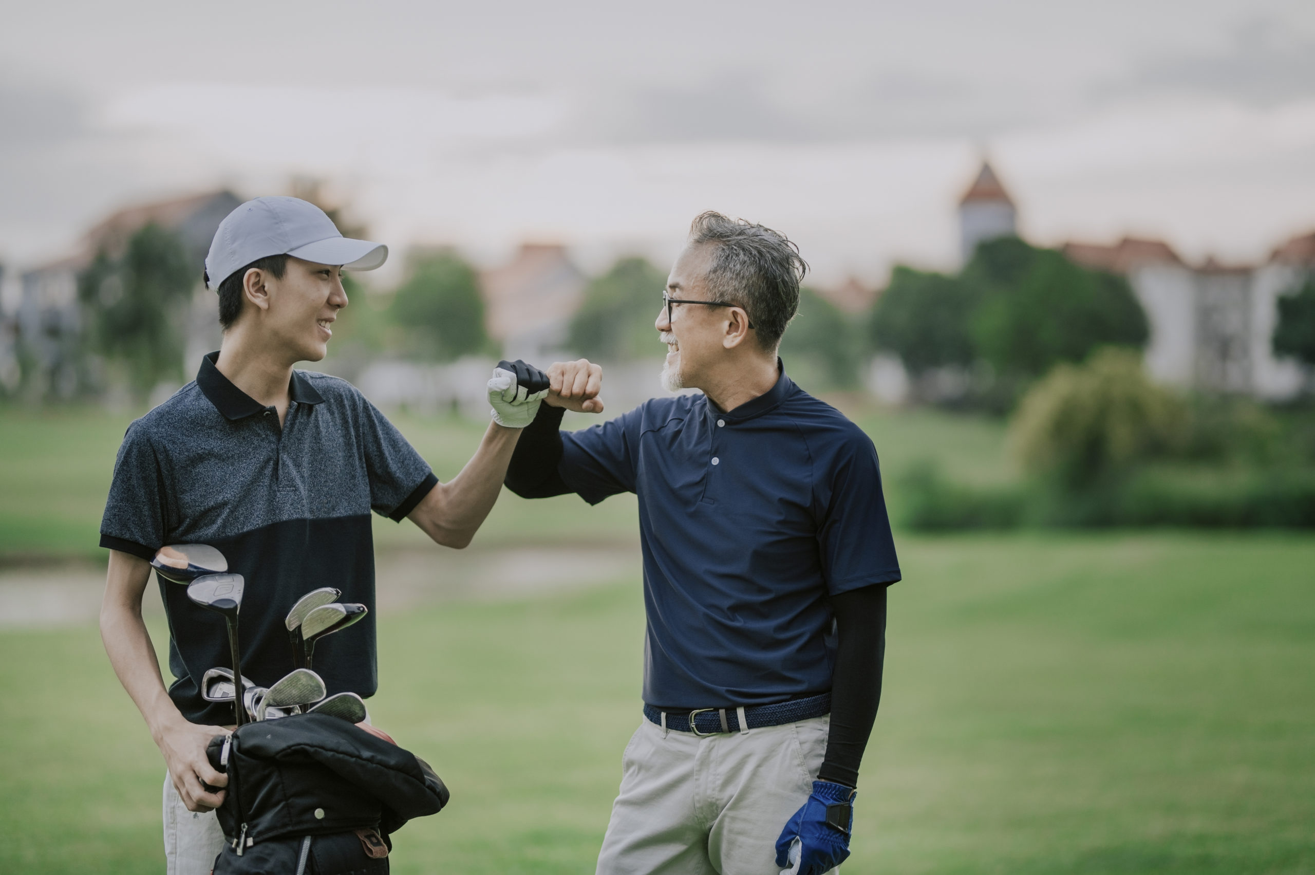 A Father and Son Playing Golf