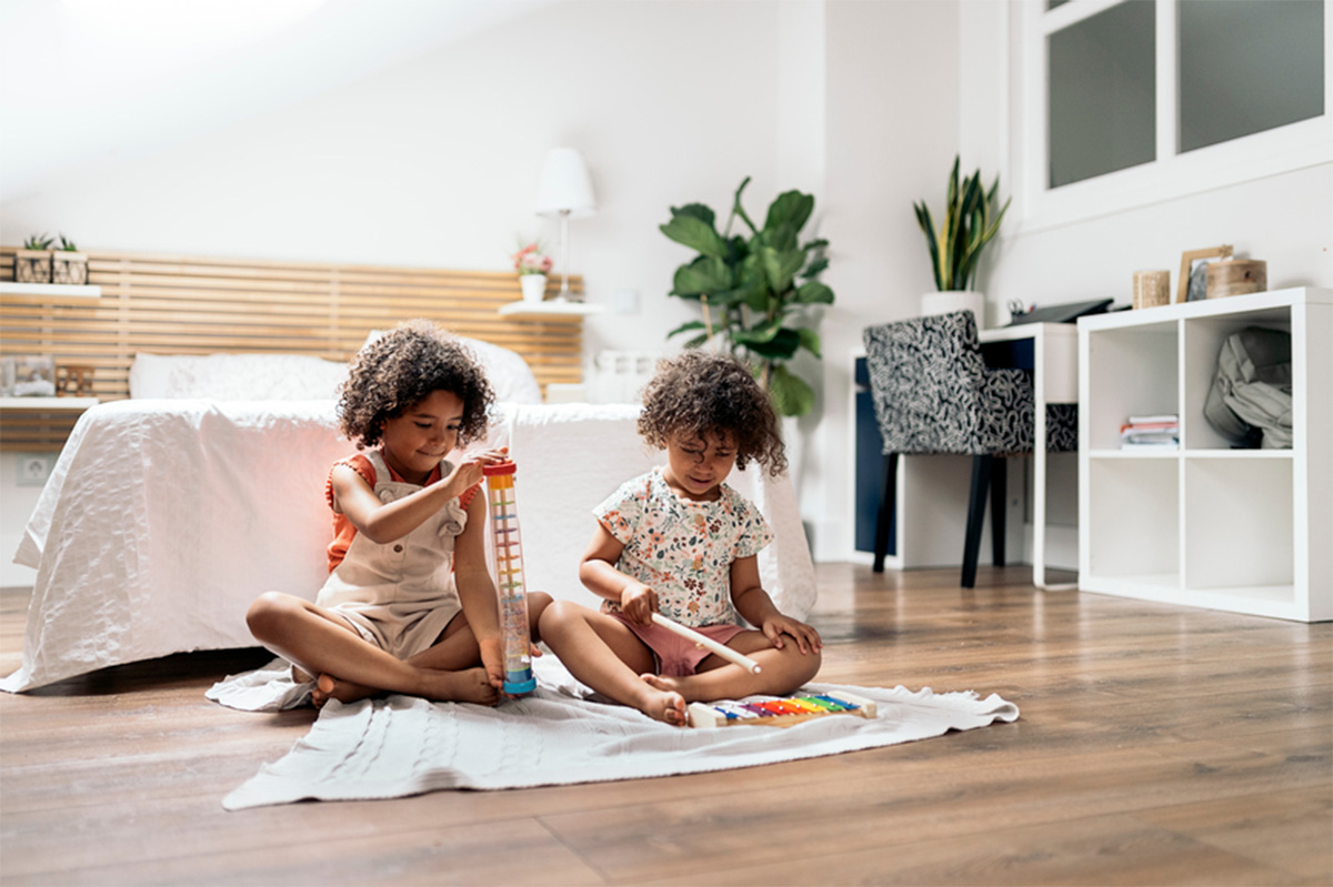 Young children playing with toys at Independence at The Preserve